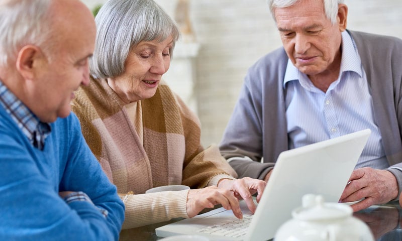Elderly Group on laptop